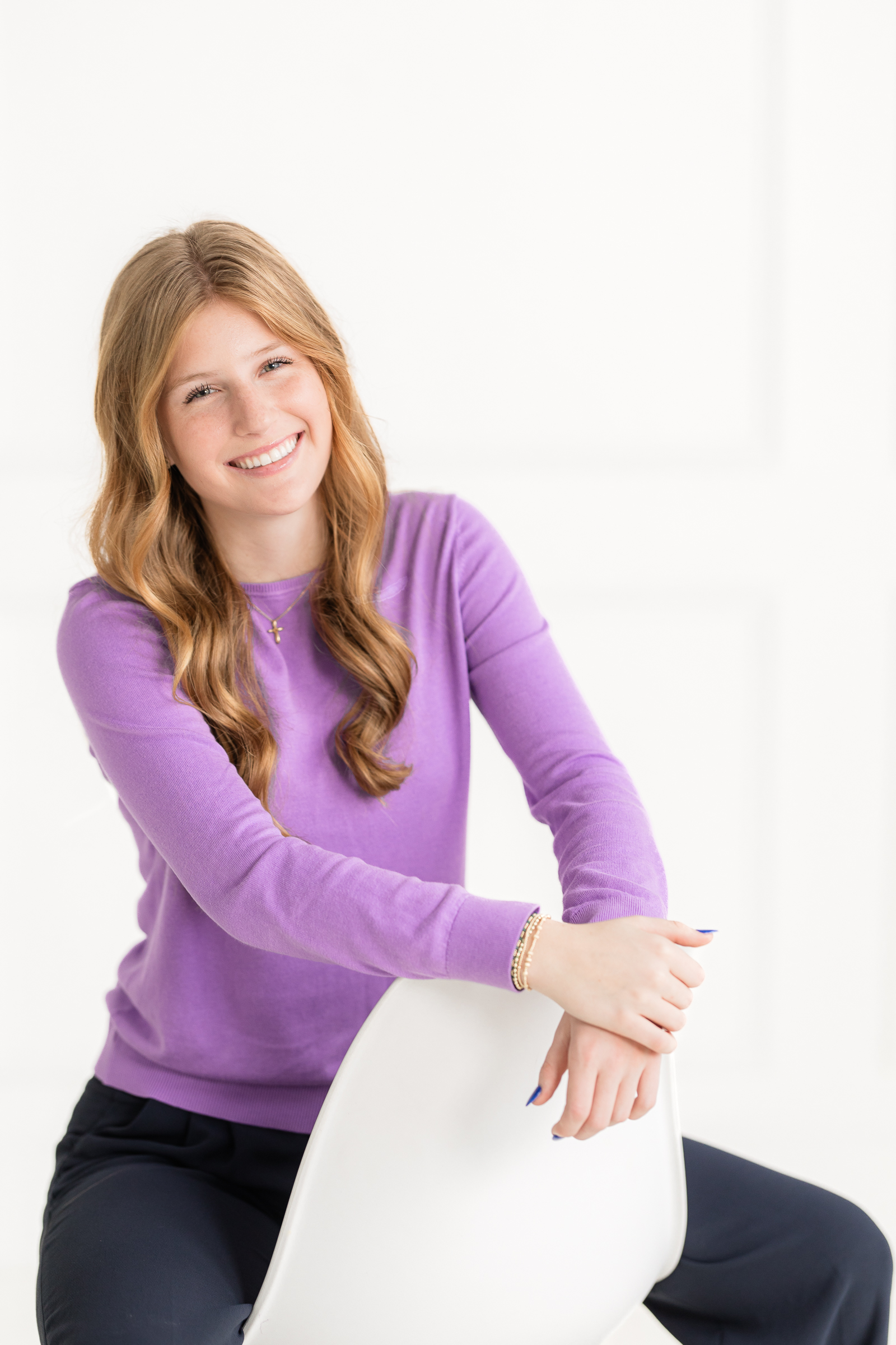 personal image in a purple top that feels approachable, modern, and authentic