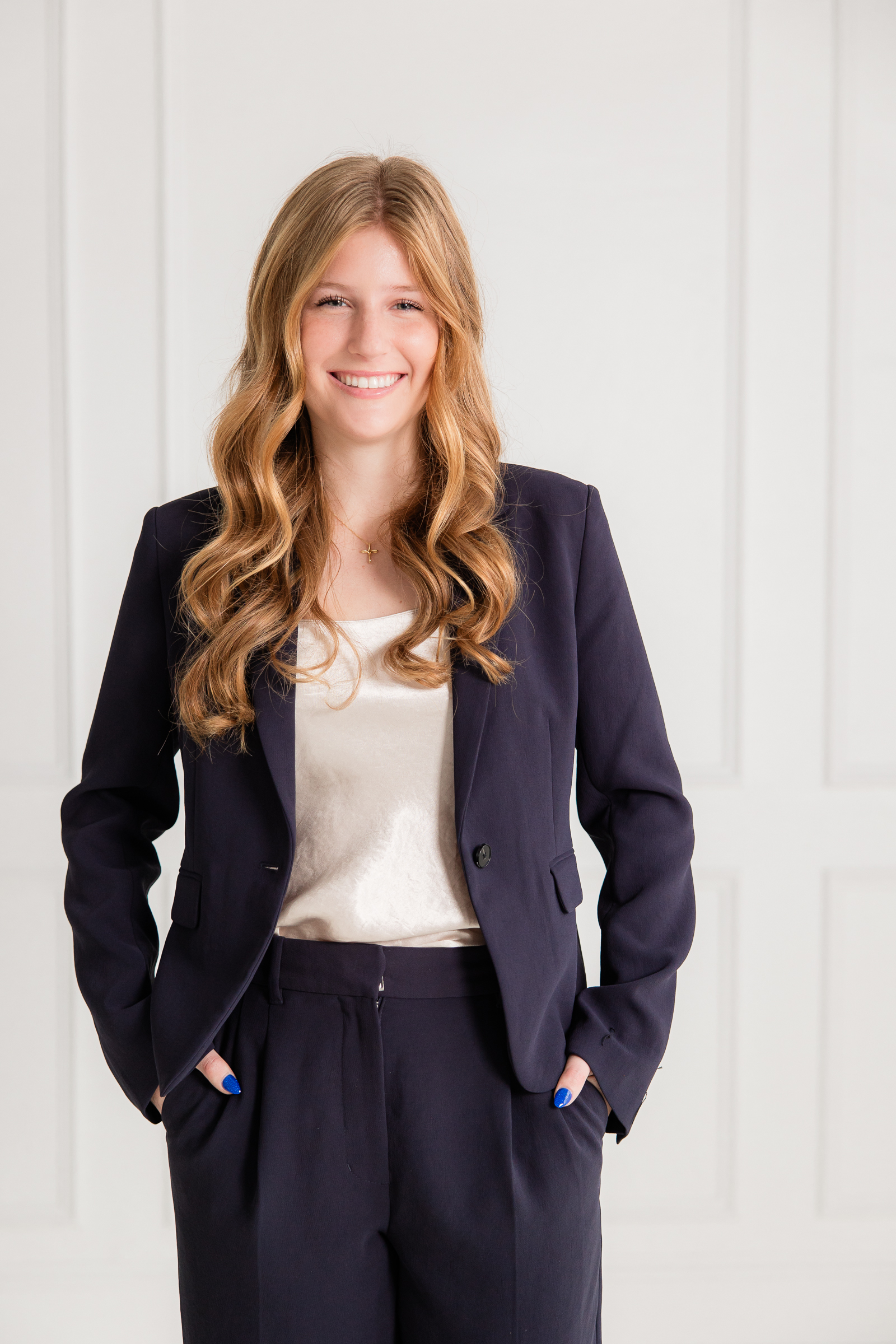natural branding photo with crossed arms that communicates confidence and approachability