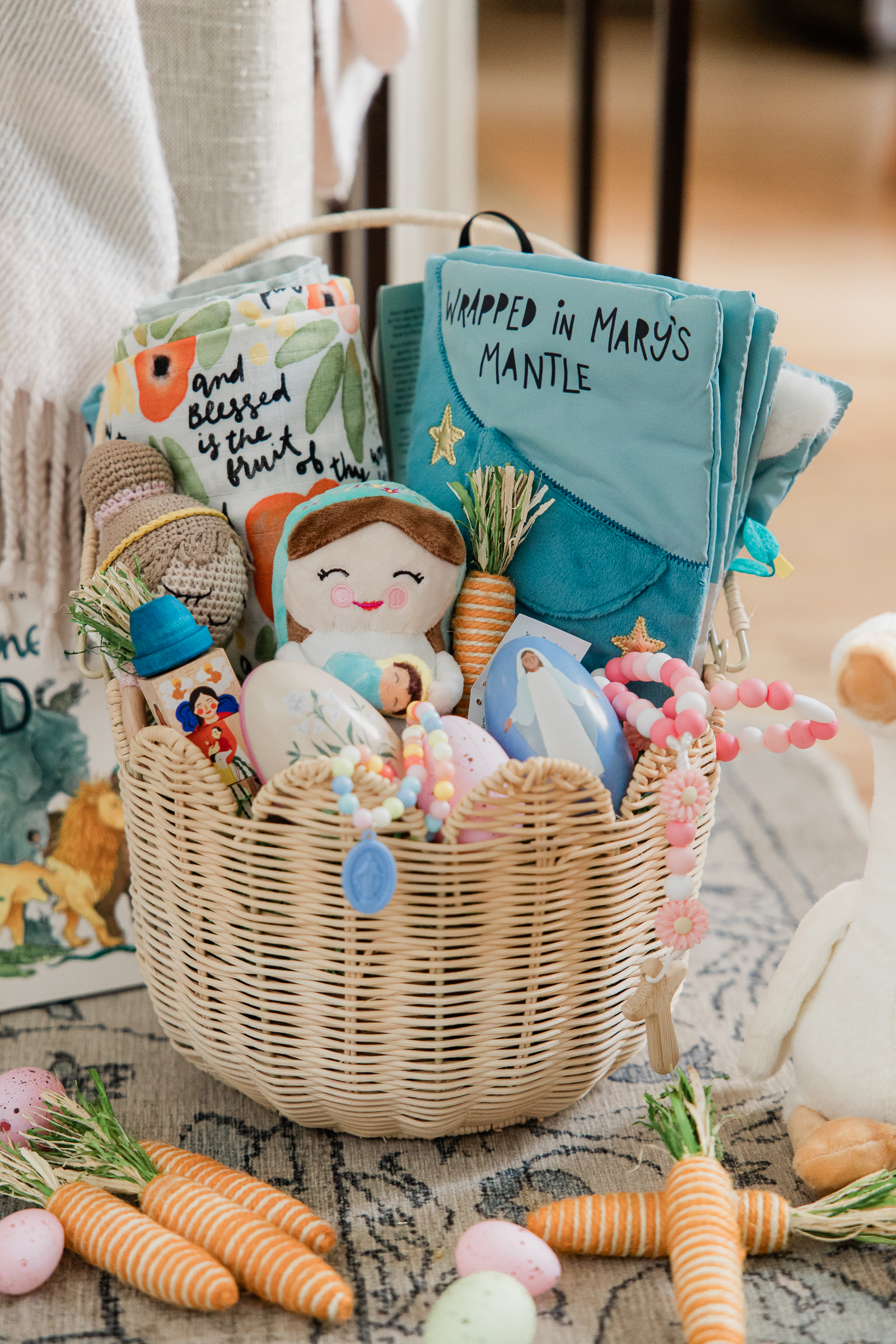 Easter basket filled with Catholic children’s gifts and faith inspired toys photographed for ecommerce branding.